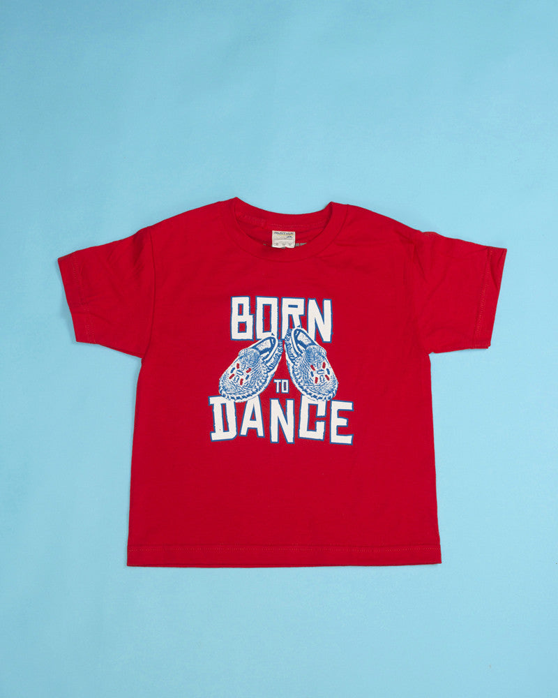 Red T-shirt with Mini-Mocs & "Born to dance" tagline. Colourfast, water-based inks, printed on premium American Apparel, pre-washed 100% soft cotton. Sizes: Toddler size 4, Youth sizes: XS, S, M