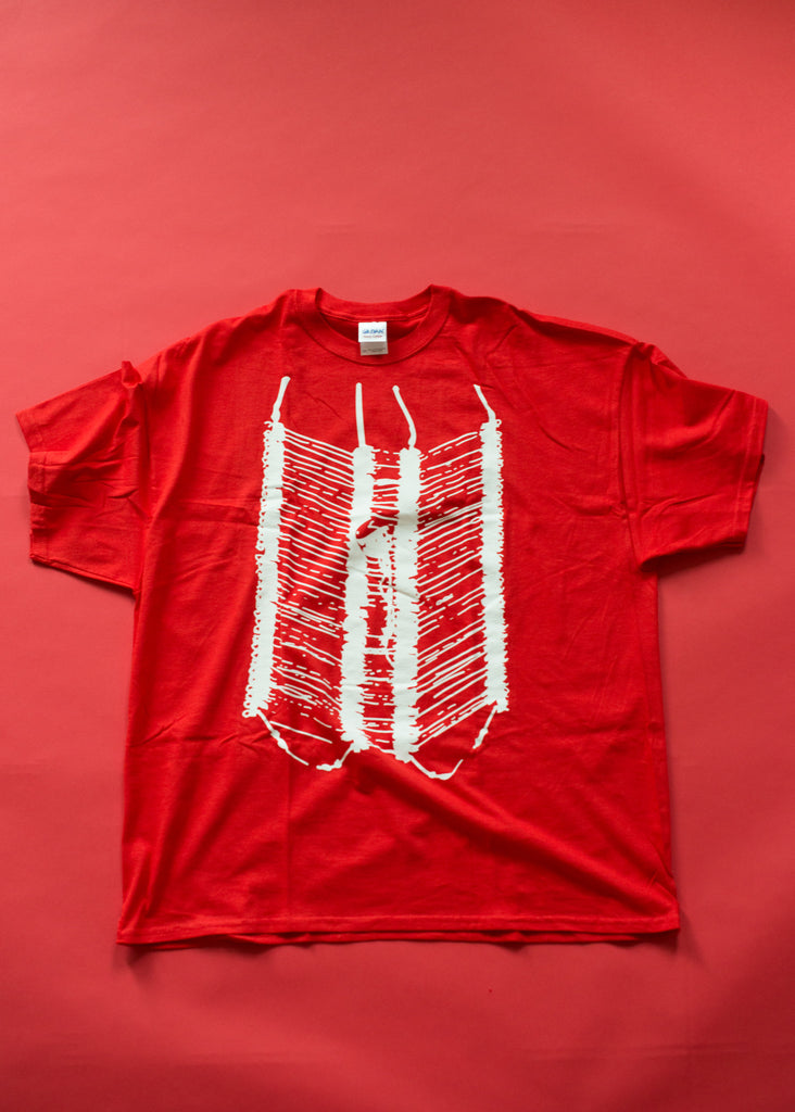 Red tshirt with silkscreened artwork of a breast plate worn by male powwow dancers.