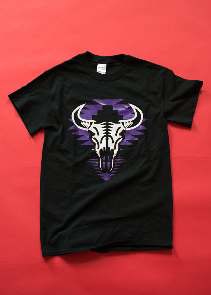 Unisex t-shirt with screenprinted black and white design of a buffalo on purple geometric pattern on a black cotton t-shirt.