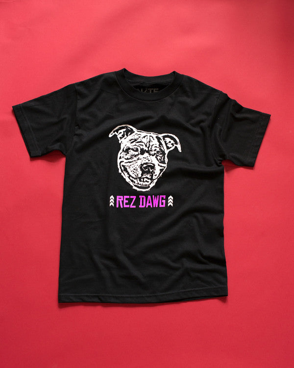 Smiling pitbull screen-printed on a black 100% cotton T-shirt, with taglin: Rez Dawg.