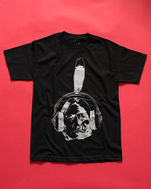 Silver and white design of a sitting bull wearing headphones on a black soft cotton t-shirt. Silver metallic ink screen-printed on a black cotton shirt 