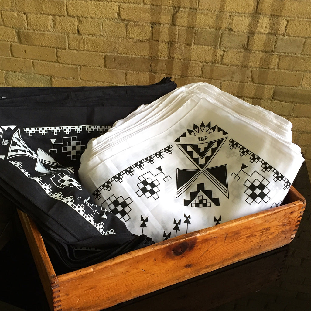 Water-based ink bandana, black and white colour options, native designs.